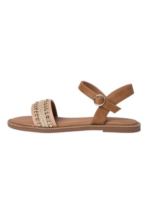 Brown flat sandal with ankle strap and buckle, front strap features braided texture and gold-tone studs for decoration.