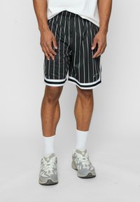 Karl Kani 2 PACK - Treningo apatinė dalis - black pinstripe white