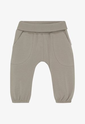 Zachte beige peuterbroek met elastische tailleband en boorden, met twee voorzakken en doorstikte naden.