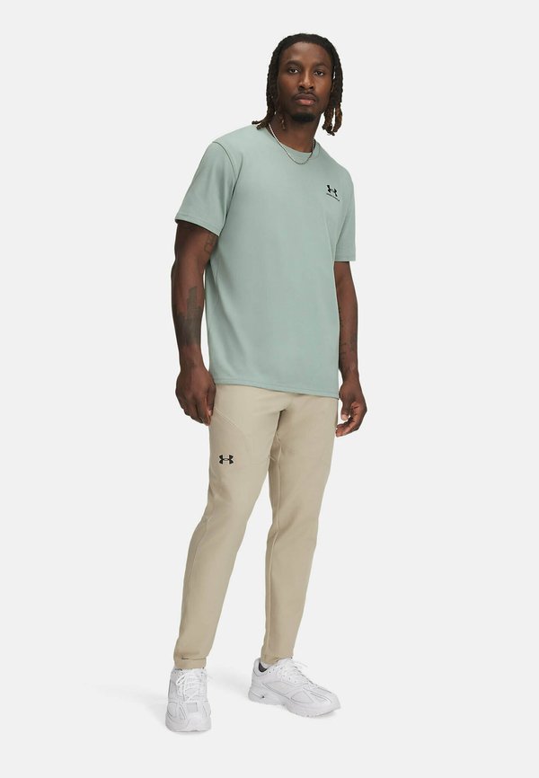 UNSTOPPABLE - Tracksuit bottoms - city khaki3