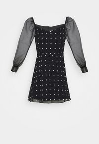 Czarna sukienka z przezroczystymi bufkami, z białymi kropkami, dopasowaną górą i rozkloszowanym dołem. Zamek błyskawiczny z tyłu, gładka tekstura.