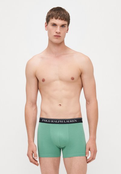 Πράσινα βαμβακερά εσώρουχα τύπου boxer με μαύρη ζώνη που φέρει το λογότυπο "POLO RALPH LAUREN". Λείος υφή, εφαρμοστή σχεδίαση.