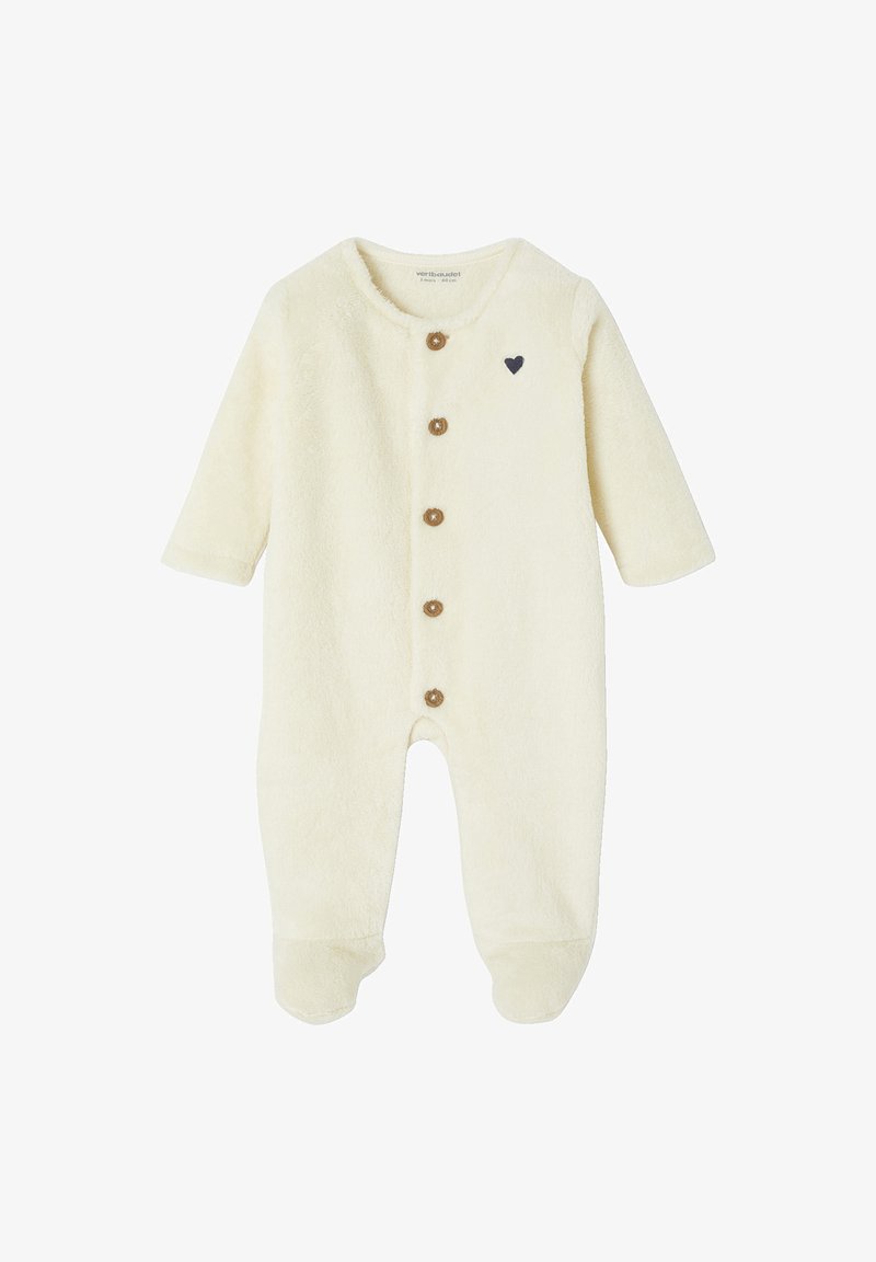 Cremfarbener, flauschiger Overall mit langen Ärmeln, rundem Halsausschnitt und Holzknopfverschlüssen; verfügt über ein kleines schwarzes Herzakzent.