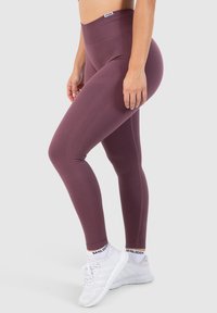 Smilodox SCRUNCH EFFECT SOLID LEGGINGS SPORT FITNESS - Leggings - dunkel lila