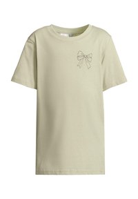 Lys grøn T-shirt lavet af bomuld, med en simpel sort sløjfeillustration på venstre brystområde, korte ærmer og rund halsudskæring.
