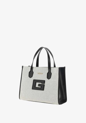 Borsa tote in tessuto grigio con dettagli in pelle nera. Presenta manici doppi, un prominente logo "G" nero e branding dorato sulla parte anteriore.