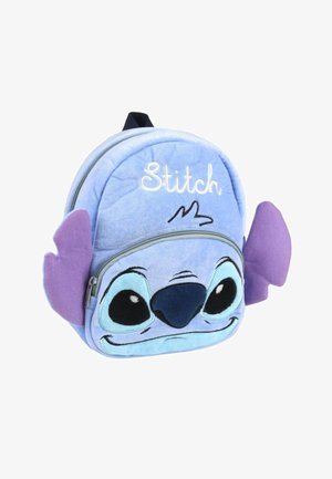 Blue plush backpack shaped like a cartoon character's face with large eyes. Features embroidered "Stitch" and purple fabric ears. Zip closure.