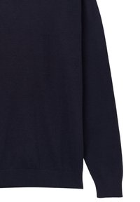 Marineblauer Pullover mit langen Ärmeln, aus weichem Material gefertigt. Besitzt einen runden Halsausschnitt sowie gerippte Bündchen und Saum für eine figurbetonte Passform.