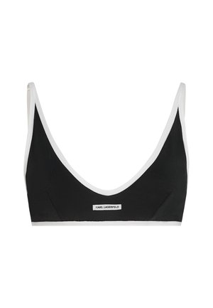 Fekete bralette fehér szegéllyel és egy kis Karl Lagerfeld logós címkével a elülső pánt közepén.