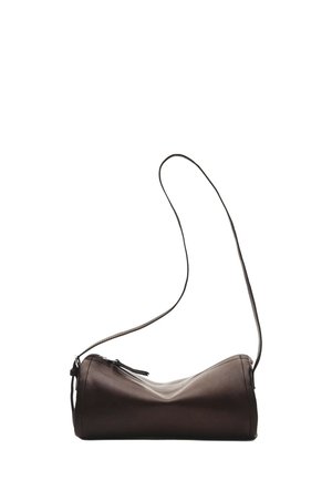 Small dark brown leather shoulder bag with curved rectangular shape and thin adjustable strap on white background.