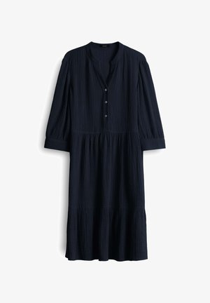 Navyblauw, geweven katoen jurk met een V-hals, drie knopen en driekwartmouwen. Uiteinde met een uitlopend effect en geplooide accenten.