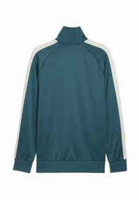 Teal træningsjakke med høj krave, hvide sidelommer og ribbede manchetter. Glat stof med en afslappet pasform og matchende kant.