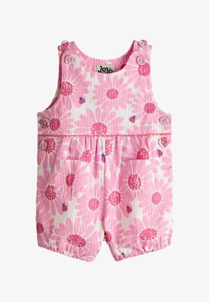 Rozā un balts bērnu kombinezons ar lielu ziedu rakstu, mārīšu apdruku, priekšējām kabatām un pogām aizpogātām plecu siksnām.