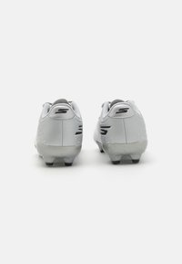 Gray soccer cleats with a smooth synthetic upper, black accents, and prominent branding. Features include a short heel and rubber studs.