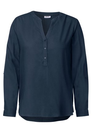 Camisa de manga larga azul marino con escote en V, tapeta abotonada y mangas remangadas. Tejido suave con un corte relajado y dobladillo curvado.