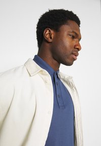 Tommy Hilfiger SLIM POLO - Poloskjorter - faded indigo