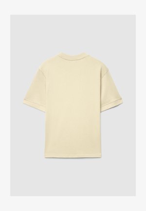 Kurzärmeliges, hellbeiges T-Shirt mit rundem Ausschnitt und lockerer Passform. Aus weicher Baumwolle gefertigt, mit einfachem, schlichter Design.