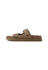 Brown suede slip-on sandal with two adjustable straps, contrasting stitching, and a cushioned rubber sole. Flat footbed design.