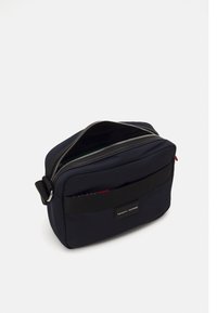 Tommy Hilfiger FUNC MINI MESSENGER UNISEX - Skuldertasker - space blue