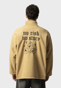 Kaotiko NO RISK UNISEX - Fleece trui - camel