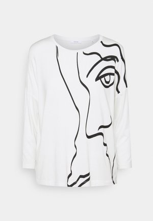 Bílé tričko s dlouhým rukávem, které má černý liniový výkres obličeje, volný střih a kulatý výstřih. Hladká bavlněná tkanina.