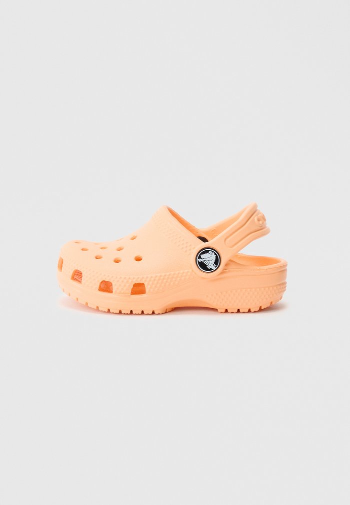 Crocs CLASSIC UNISEX - Sandalias planas - electric sunstone