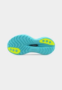 Μπλε και κίτρινη ελαστική σόλα παπουτσιού τρεξίματος με ζικζακ σχέδιο πέλματος και ετικέτα "Speedroll Technology" στο κέντρο.