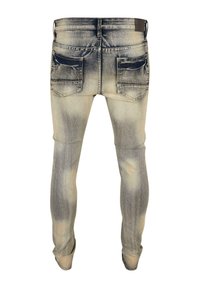 Lysvaskede denimjeans med en falmet fremtoning, med fem lommer og slim fit-design. Slitte teksturer og mørke sømdetaljer.