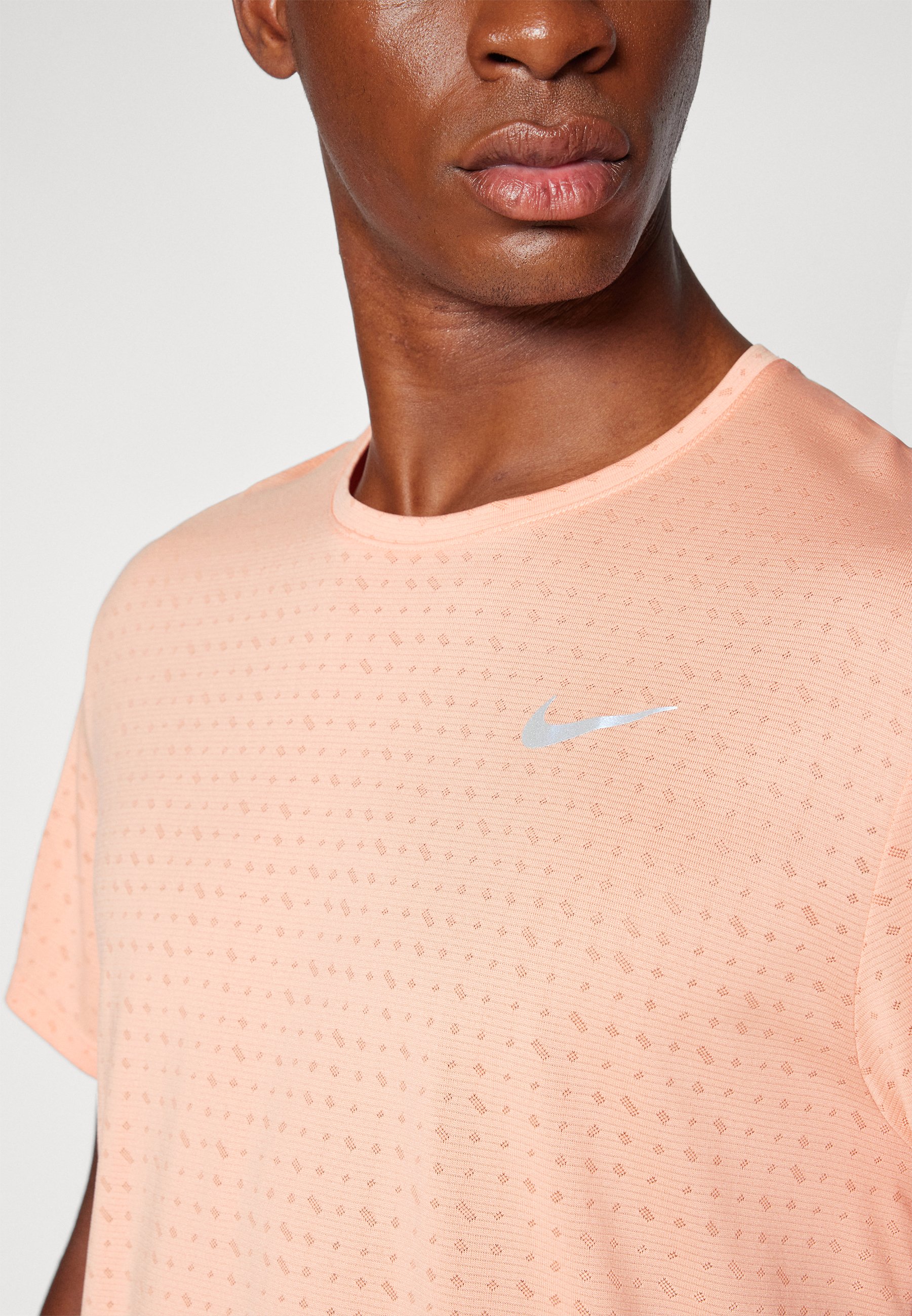 nike miler peach