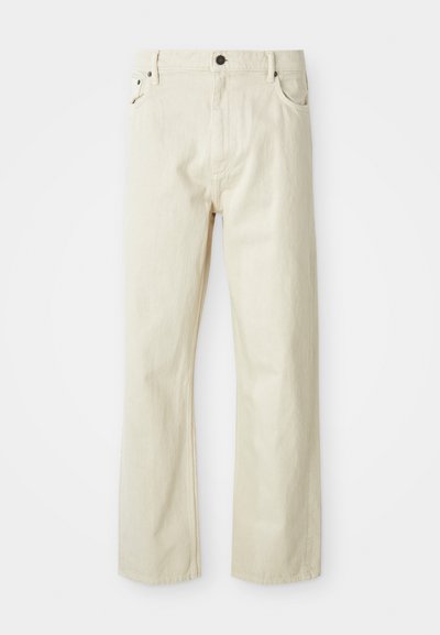 Beige bomullsbukser med rett benpassform, fem lommer, knappelukking og synlige sømdetaljer. Glatt tekstur med et uformelt design.
