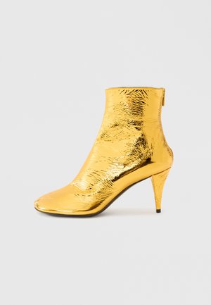 Augstpapēžu puszābaki - gold-coloured