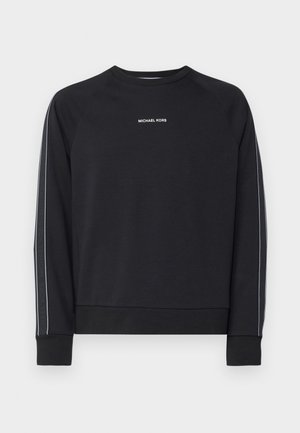 Sweatshirt noir avec col rond, manches raglan, texte logo blanc et rayures sur les côtés. Tissu doux avec une coupe décontractée. Poignets et bas côtelés.