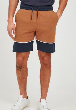 Pantalones cortos de mezcla de algodón marrón con acentos en azul marino, ribete blanco, cintura con cordón, bolsillos laterales y un corte relajado.