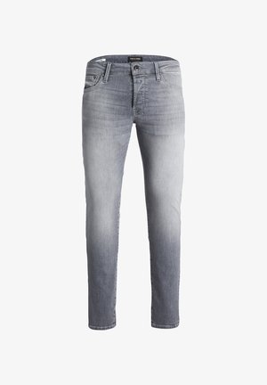Jean en denim gris avec une finition délavée, design slim fit, style à cinq poches, fermeture à bouton en métal et passants de ceinture à la taille.