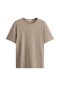 T-shirt beige uni à manches courtes et col rond, présenté à plat sur fond blanc.