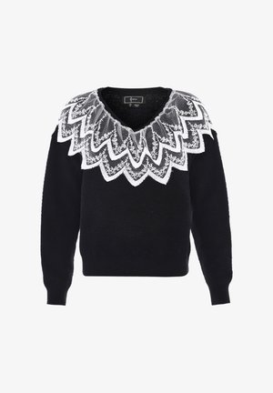 Black sweater with a V-neck and a scalloped white lace collar. The fabric is textured, and the outline of the collar features intricate patterns.