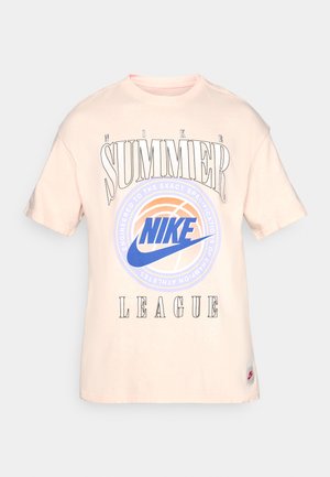 Light pink cotton t-shirt with a round neck, short sleeves, and a graphic print featuring "NIKE SUMMER LEAGUE" in black, blue, and orange.