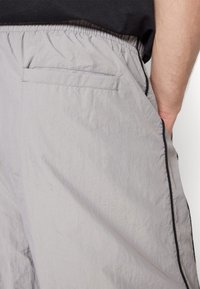 YOURTURN UNISEX - Spodnji deli trenirk - grey