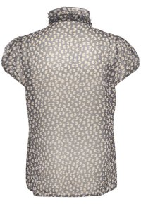 Blusa trasparente a maniche corte con colletto arruffato, caratterizzata da un motivo a cuori color crema su un tessuto traslucido scuro.