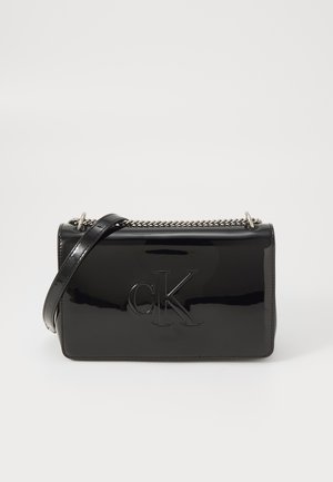 SCULPTED FLAP - Cross body bag - black