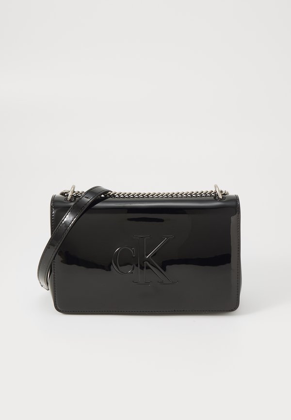 SCULPTED FLAP - Cross body bag