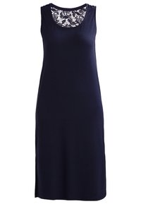 Robe sans manches bleu marine foncé avec un col rond et un panneau en dentelle florale au niveau de la partie supérieure de la poitrine et du dos.