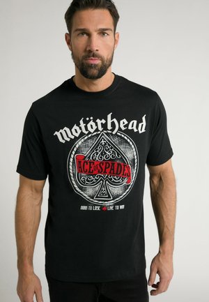 Sort bomulds t-shirt med "Motörhead" tekst og et "Ace of Spades" grafik i hvid og rød med detaljeret spar design. Korte ærmer.