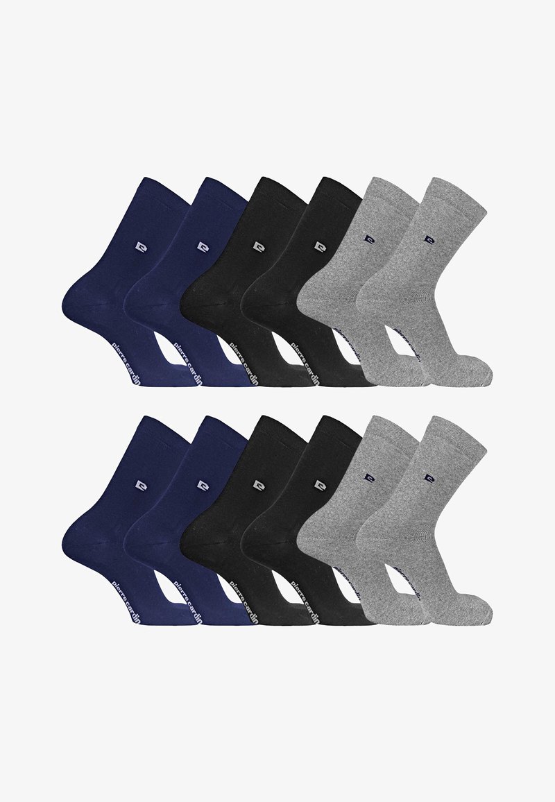 Deux ensembles de six chaussettes unies à hauteur de cheville, en bleu marine, noir et gris, disposés côte à côte sur un fond blanc.