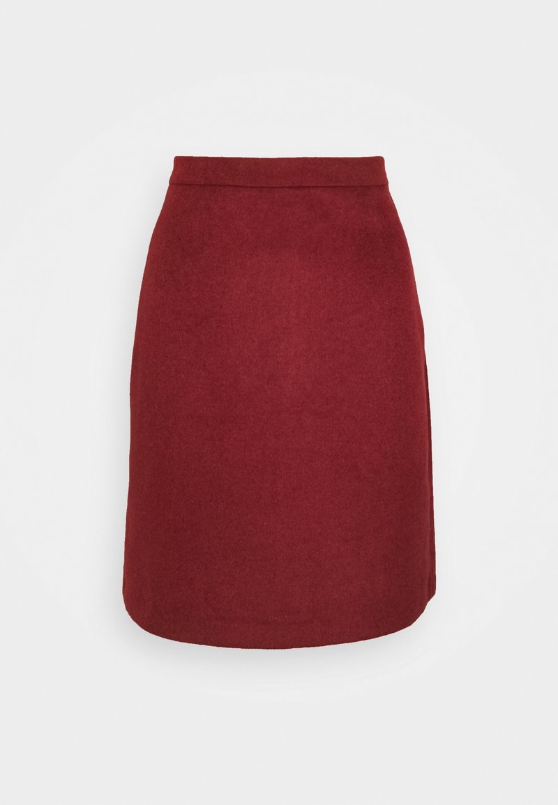 Burgundy ullkjol med åtsittande midja, rak skärning och lätt utsvängning vid fållen. Sömmar längs vänster sida. Slät textur.