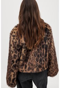 Leopard-print faux fur jacket with a cropped design, thick texture, and loose sleeves. Style features dark brown and tan patterns.