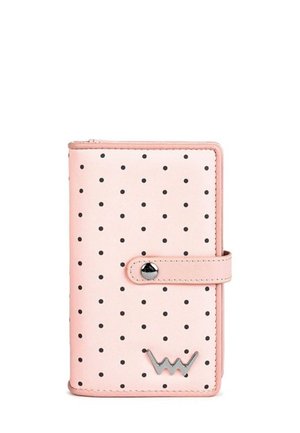 Pink wallet with black polka dots, made of faux leather. Features a snap closure and a silver logo accent at the bottom right corner.