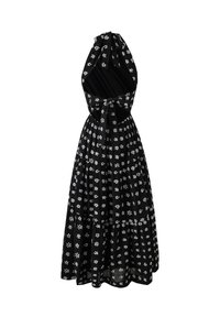 Schwarzes ärmelloses Kleid mit einem floralen weißen Muster, einem taillierten Oberteil und einem ausgestellten Rock mit einem gestuften Saum. Bindegürtel im Rücken.