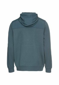 Sweat à capuche en bleu sarcelle foncé, avec un motif de nid d'abeille texturé au dos et une partie supérieure lisse, dotée de poignets côtelés.