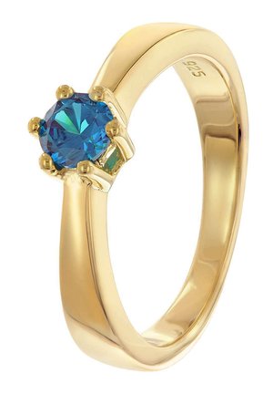 Goldfarbener Ring mit einem runden, blauen Edelstein in einer sechsclaw-Setting, mit einem glatten, polierten Band und "925" innen eingraviert.